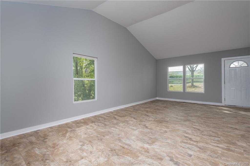 113 Steakhouse Road Morganton, NC 28655 - Photo 14 of 19 an empty room with windows