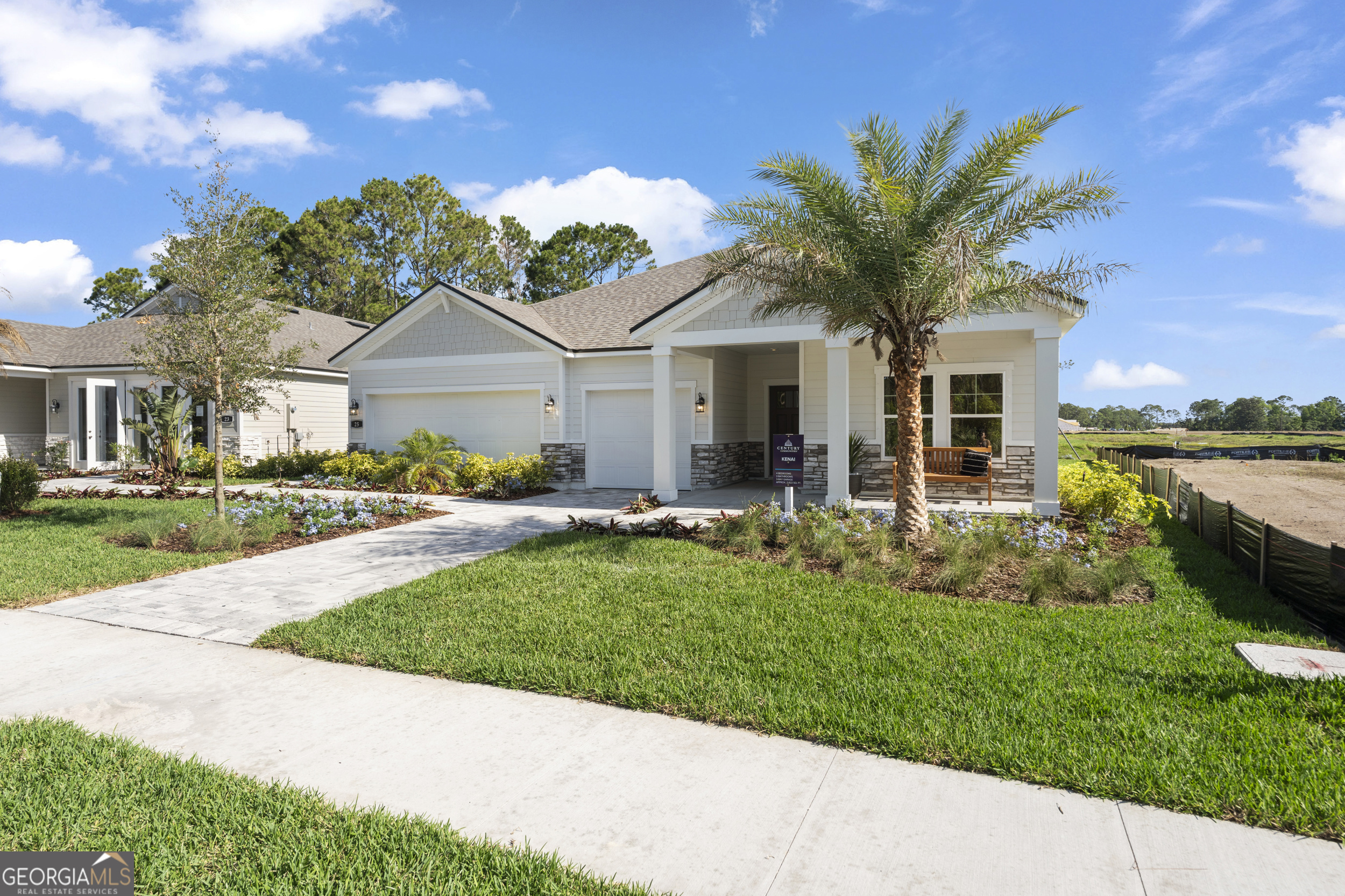 236 Park View Lane Kingsland, GA 31548 - Photo 6 of 17 a front view of a house with a yard and potted plants