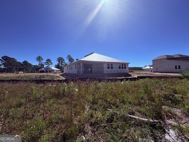 236 Park View Lane Kingsland, GA 31548 - Photo 8 of 17 a view of a house with a yard and a lake view