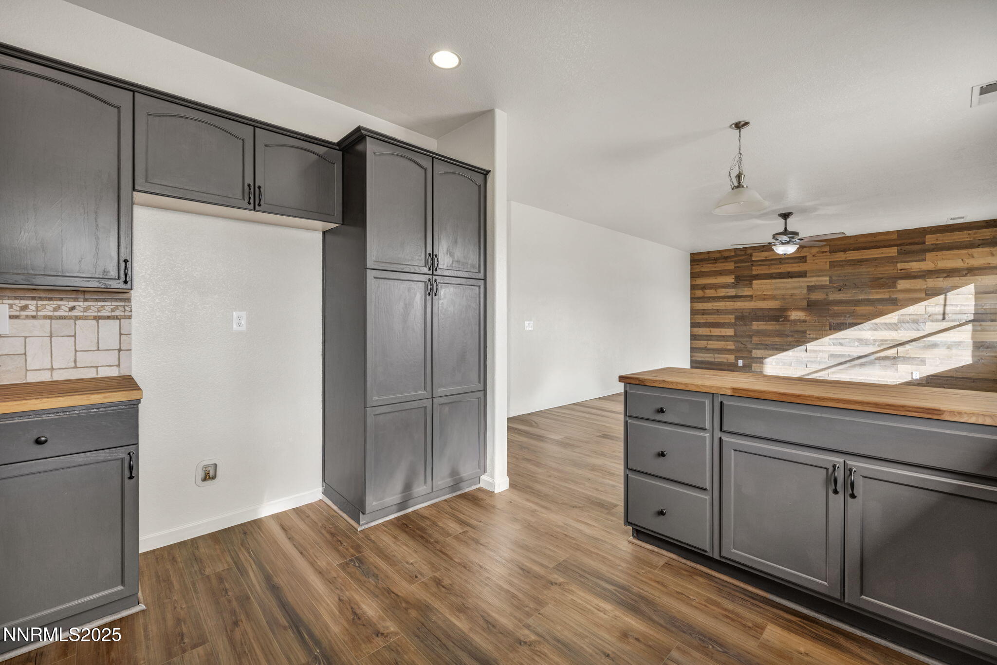 119 Red Oak Court Fernley, NV 89408 - Photo 18 of 64 a kitchen with granite countertop a refrigerator and a sink