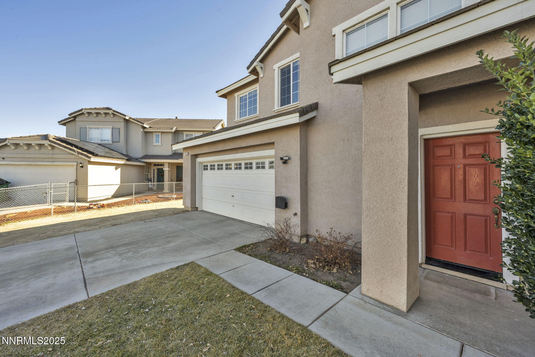 119 Red Oak Court Fernley, NV 89408 - Photo 2 of 64 a view of a house with a outdoor space