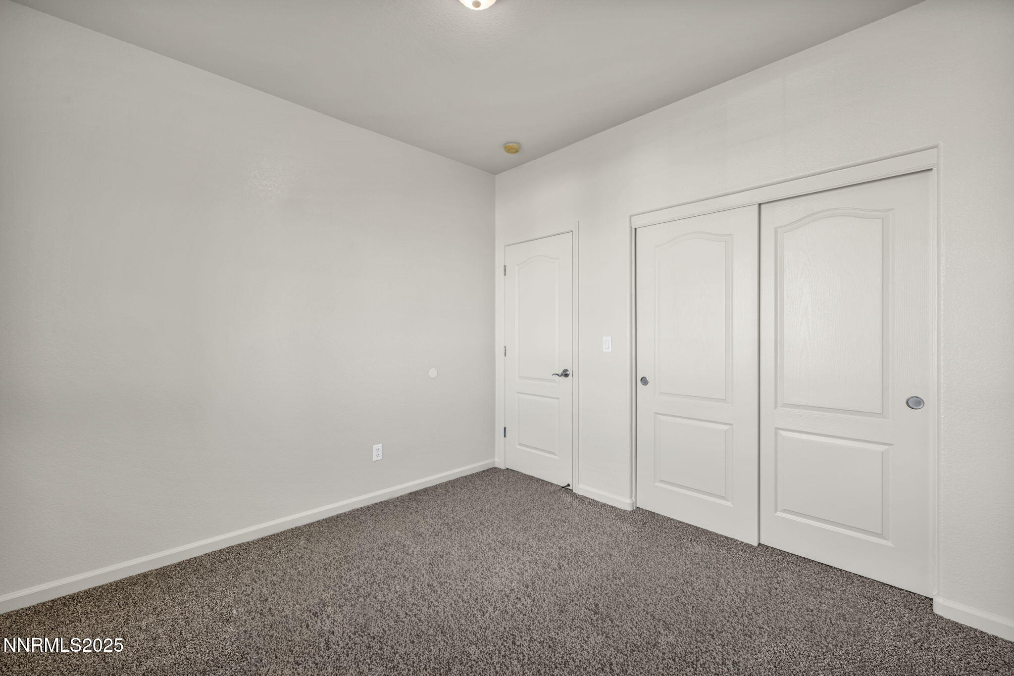 119 Red Oak Court Fernley, NV 89408 - Photo 36 of 64 a view of an empty room