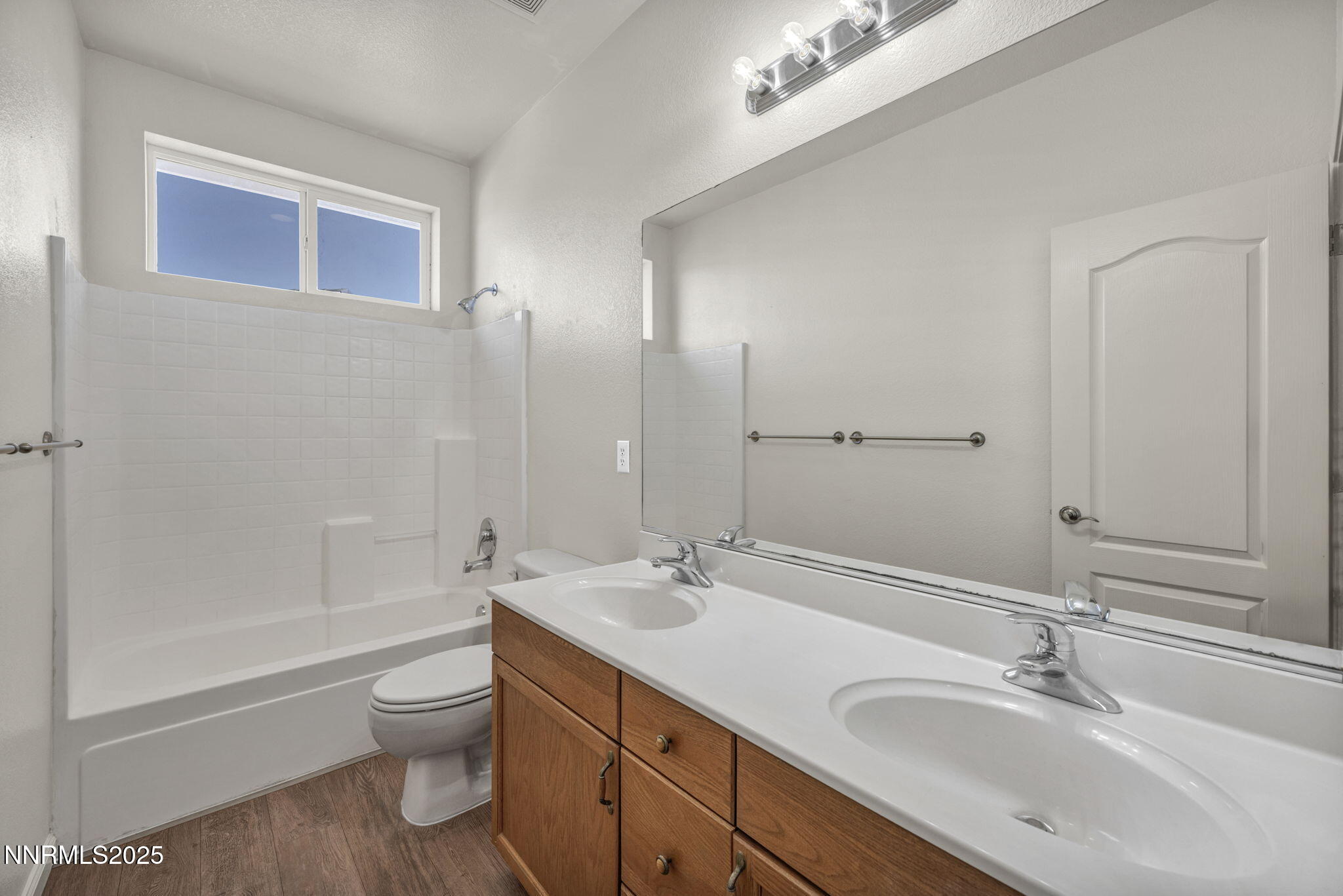 119 Red Oak Court Fernley, NV 89408 - Photo 37 of 64 a bathroom with a sink a toilet and shower
