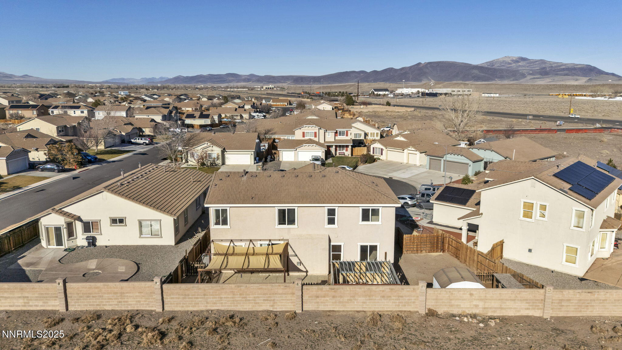 119 Red Oak Court Fernley, NV 89408 - Photo 52 of 64 an aerial view of residential houses with outdoor space and river