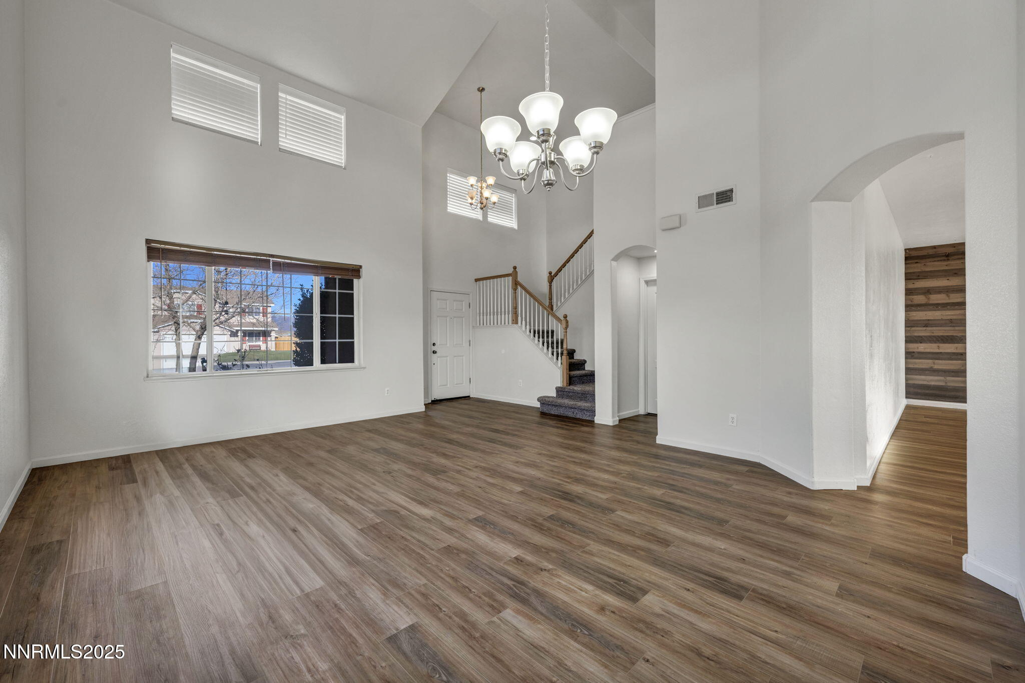119 Red Oak Court Fernley, NV 89408 - Photo 6 of 64 a view of a livingroom with wooden floor
