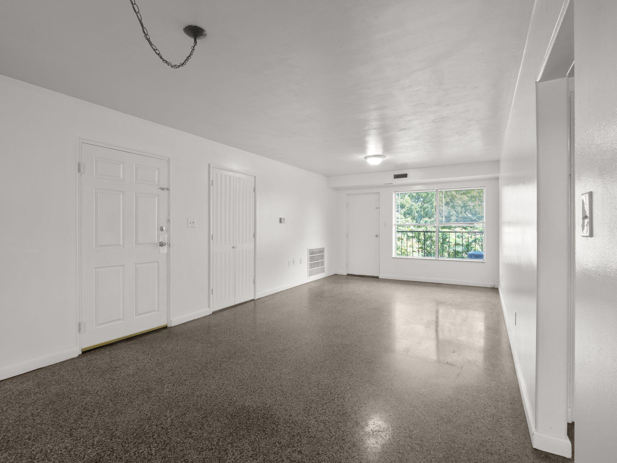 100 Ridgeview Lane, Unit 30 Bassett, VA 24055 - Photo 2 of 22 a view of an empty room with a window