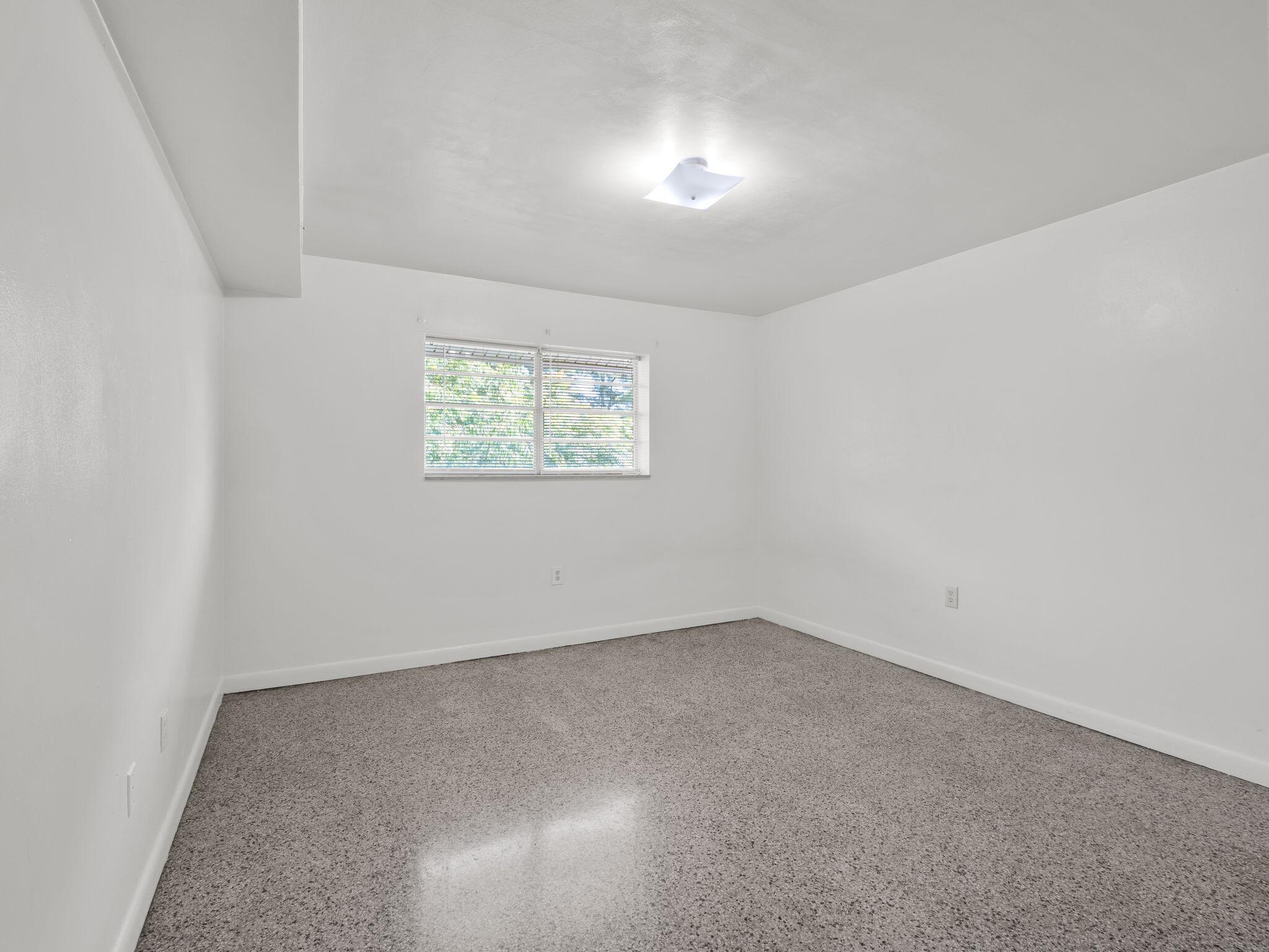100 Ridgeview Lane, Unit 30 Bassett, VA 24055 - Photo 7 of 22 an empty room with windows