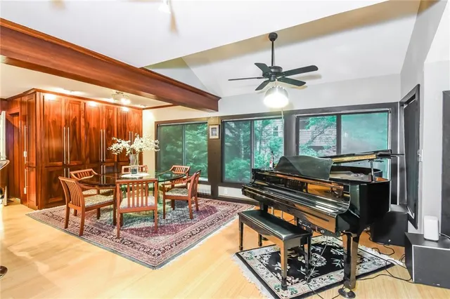 a living room filled with furniture and a table