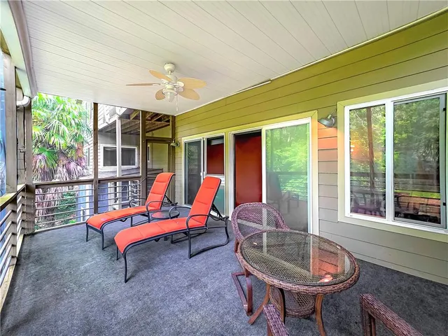 a outdoor space with a patio couch and iron swing