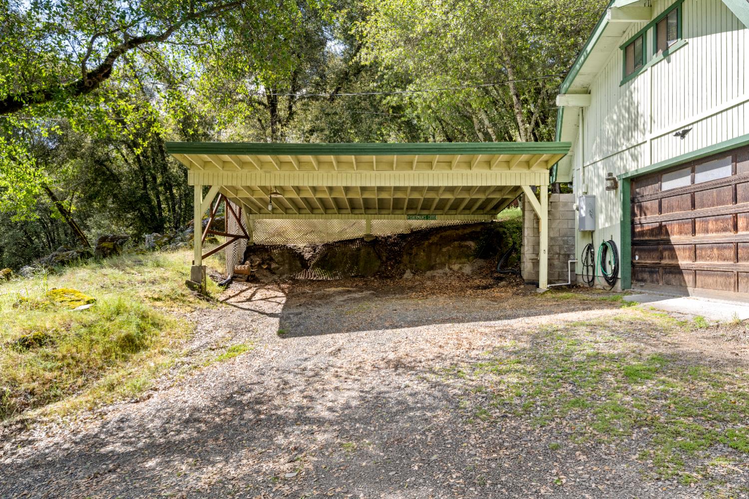 7321 Morning Canyon Road Placerville, CA 95667 - Photo 31 of 39 a view of a balcony with a fireplace