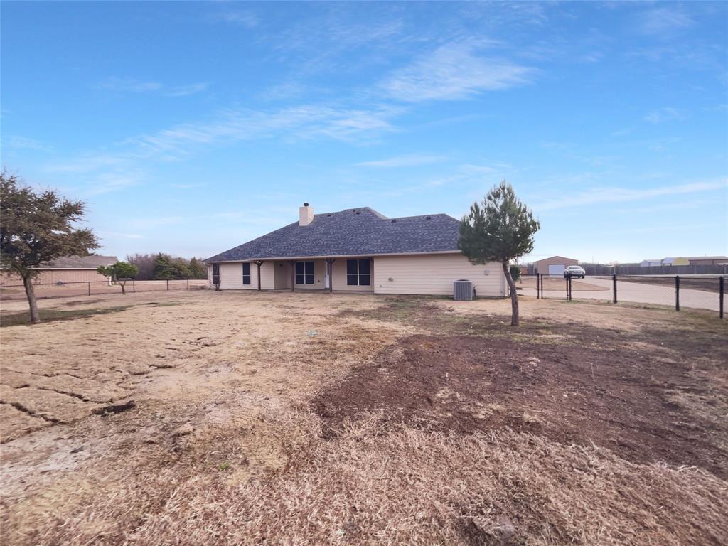 3915 Tower Circle Nevada, TX 75173 - Photo 28 of 29 a view of a yard in front of a house