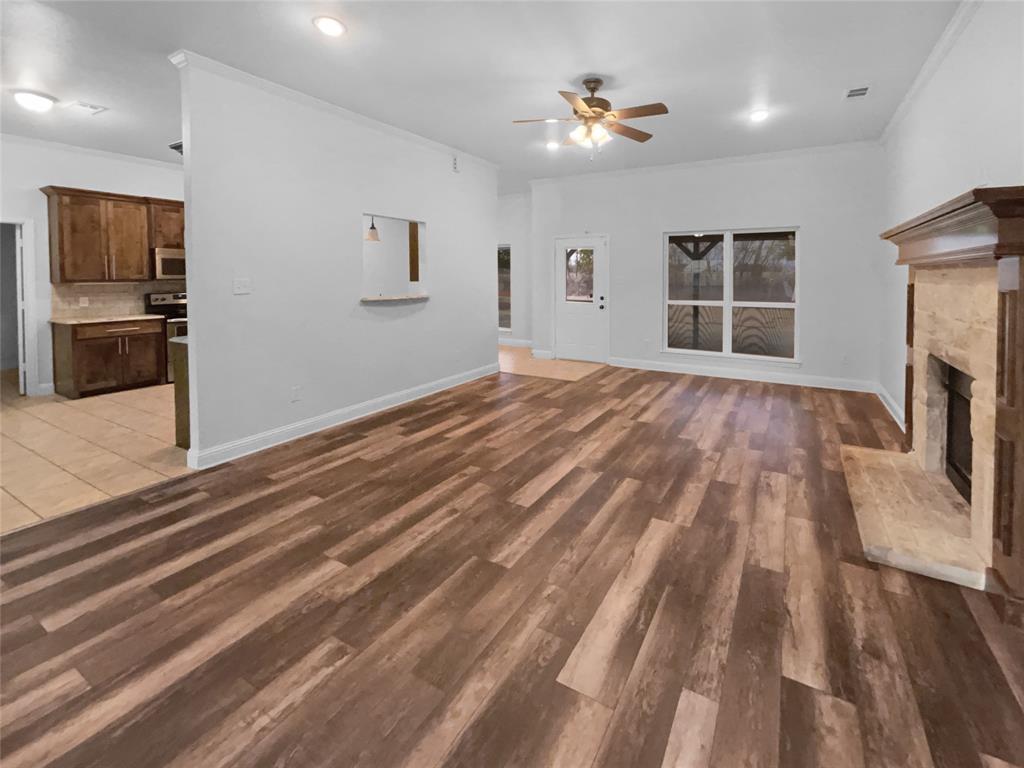 3915 Tower Circle Nevada, TX 75173 - Photo 10 of 29 a view of a livingroom with a fireplace