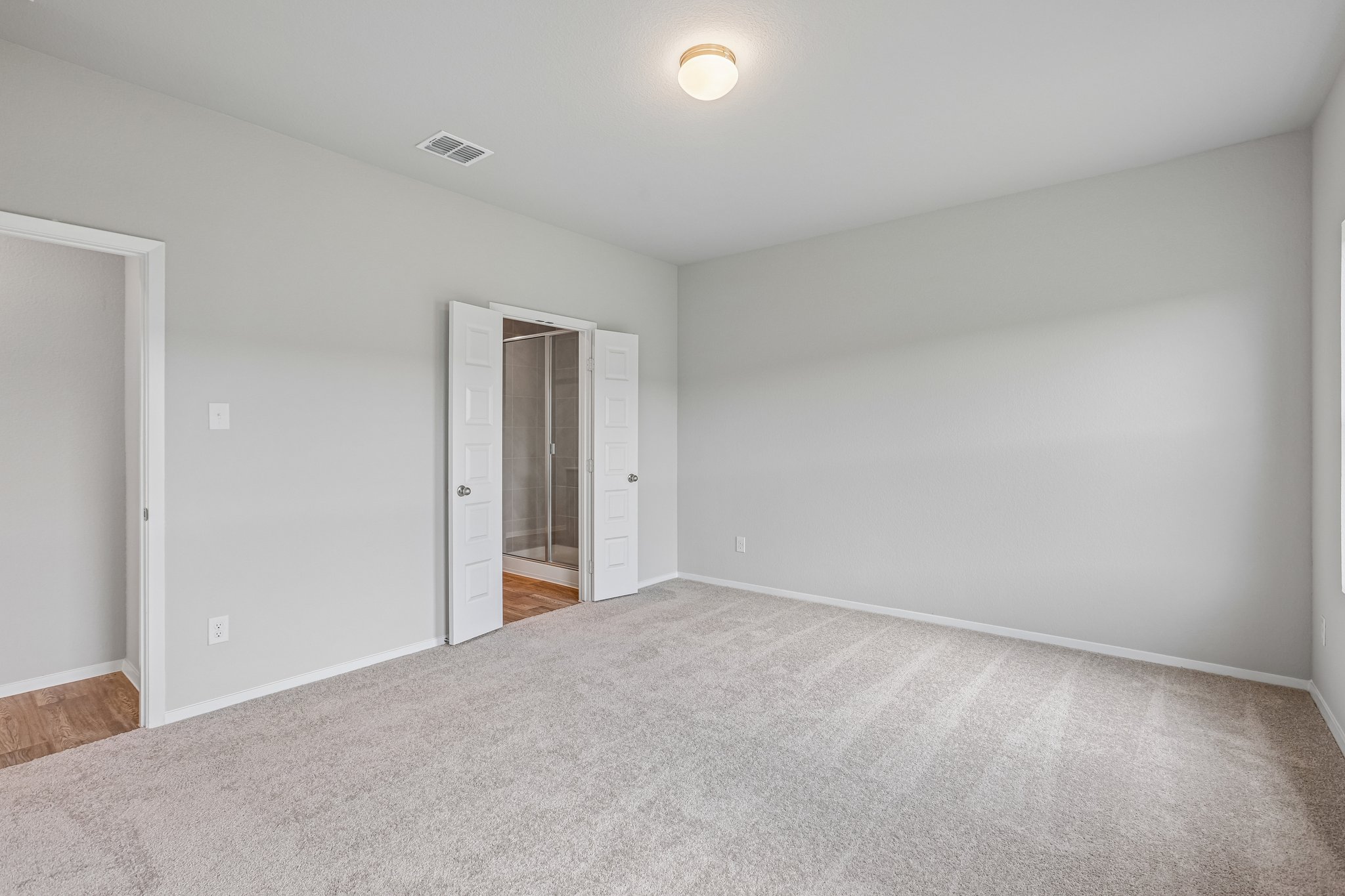 5513 Sacra Cove Austin, TX 78747 - Photo 19 of 37 a view of an empty room and closet area