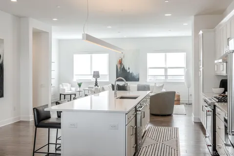 a very nice looking dining room with a large window