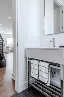 a kitchen with a sink and cabinets