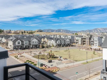 a view of a swimming pool with an ocean view