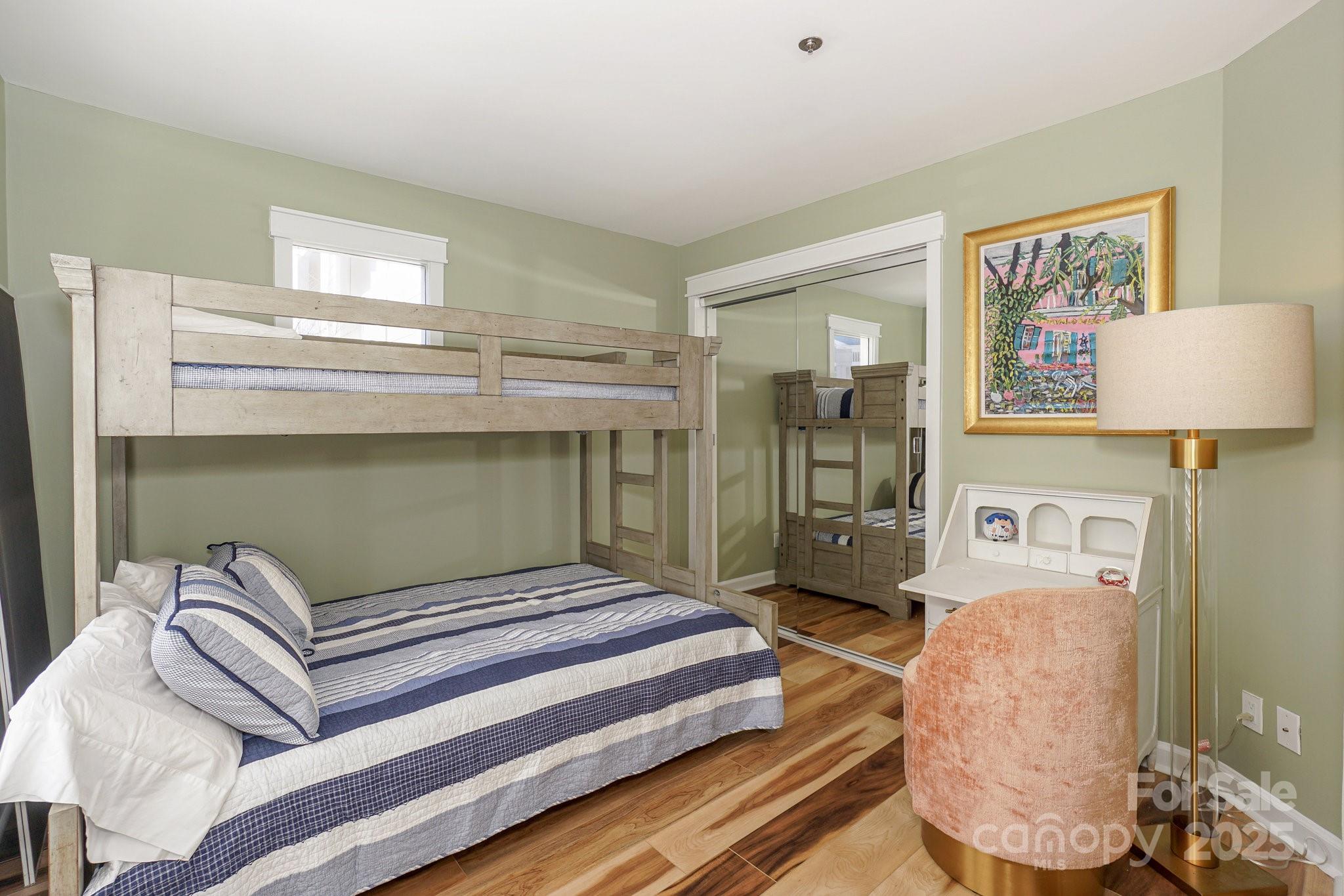 18631 Vineyard Point Lane Cornelius, NC 28031 - Photo 27 of 43 a bedroom with a bed and dresser