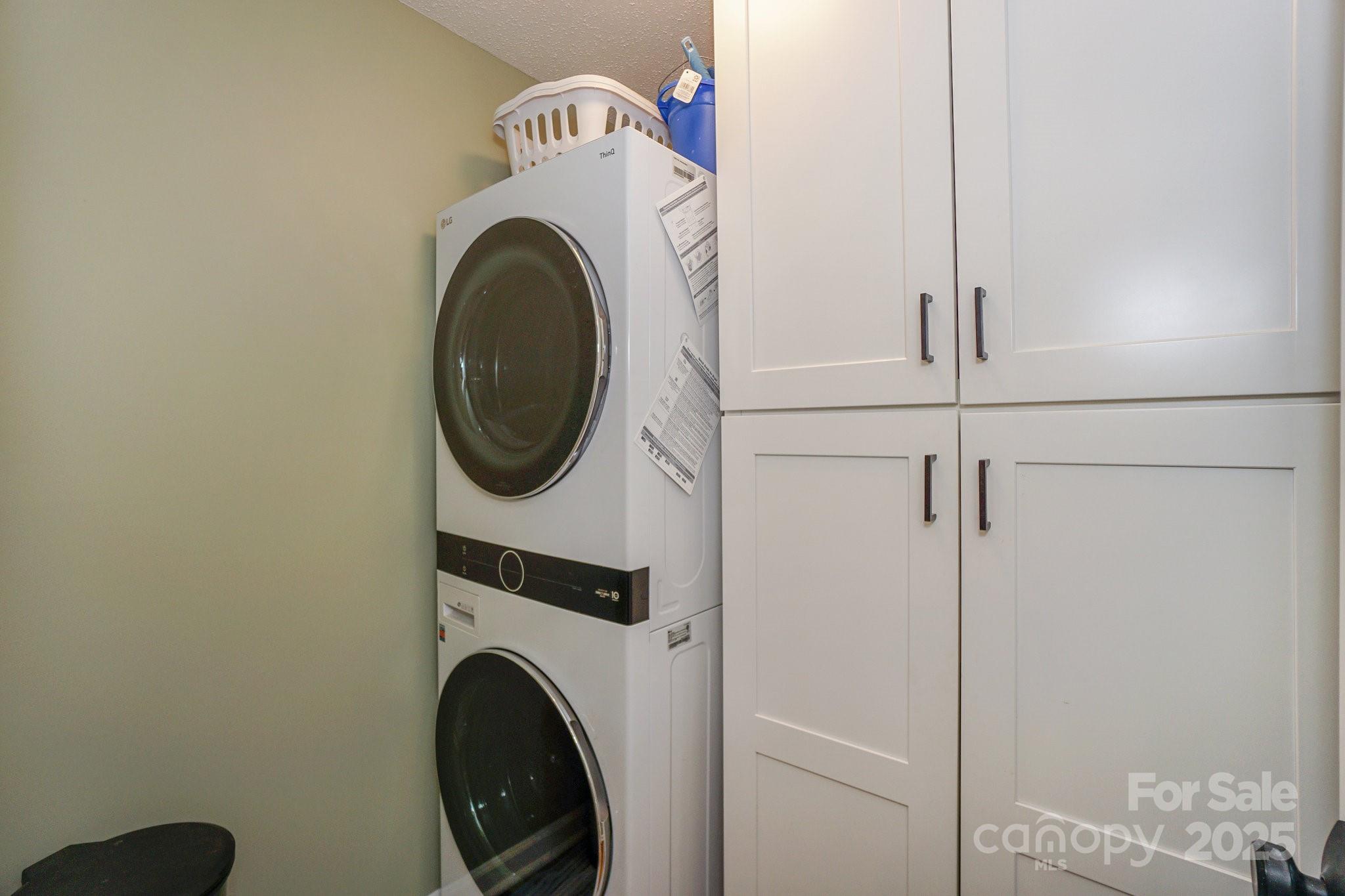 18631 Vineyard Point Lane Cornelius, NC 28031 - Photo 33 of 43 a utility room with dryer and washer
