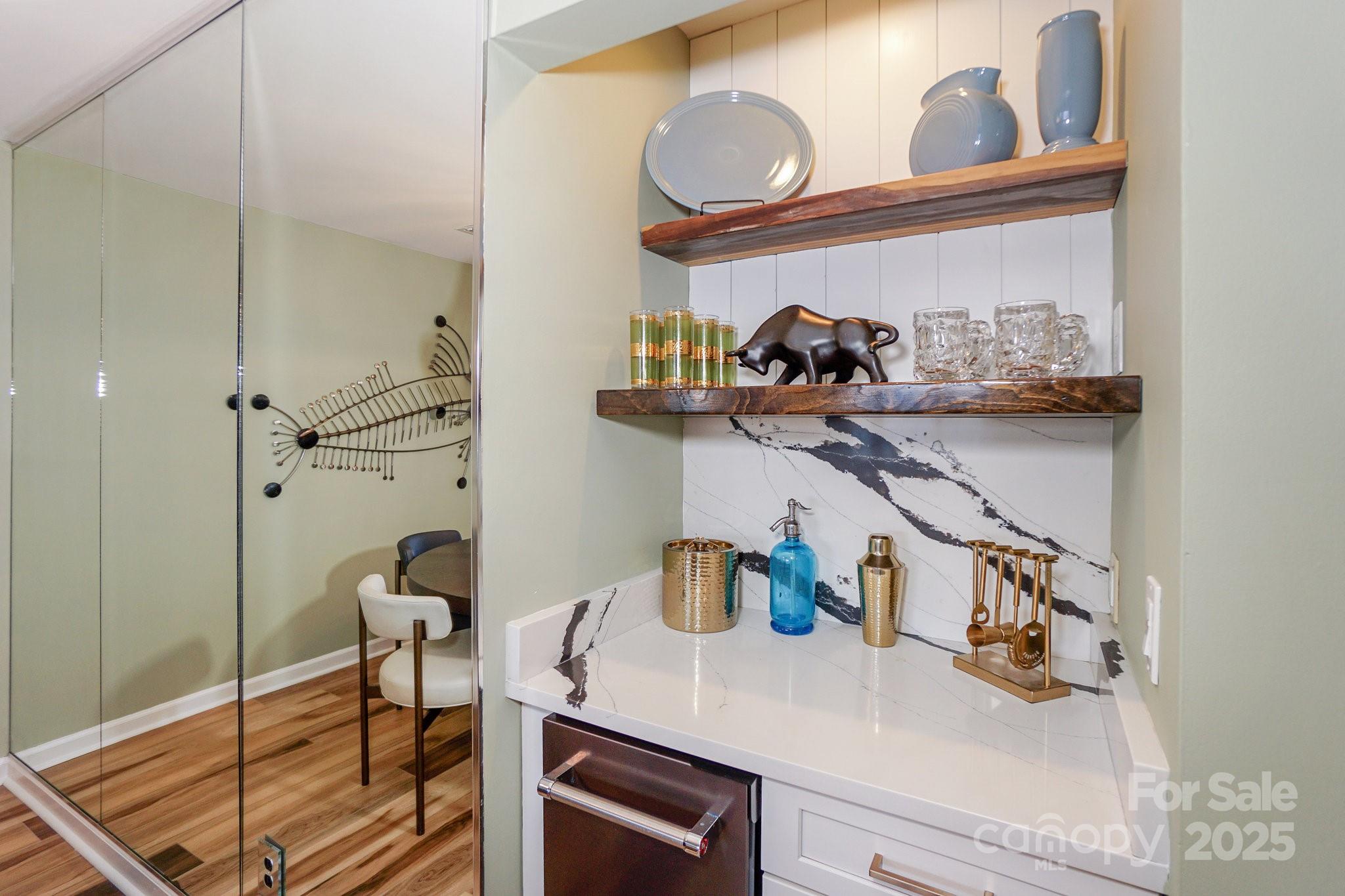 18631 Vineyard Point Lane Cornelius, NC 28031 - Photo 10 of 43 a kitchen with a table and chair