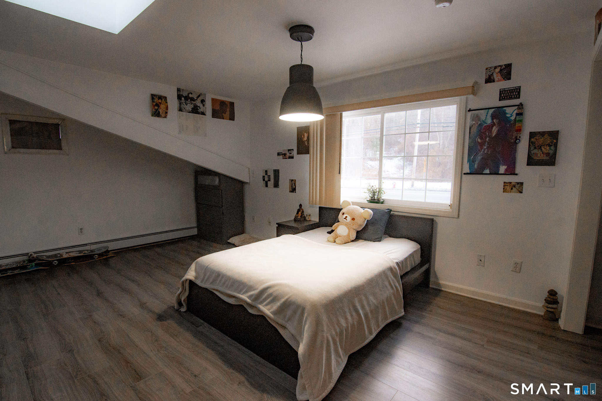 545 Church Street Naugatuck, CT 06770 - Photo 16 of 25 a bedroom with a bed and a window