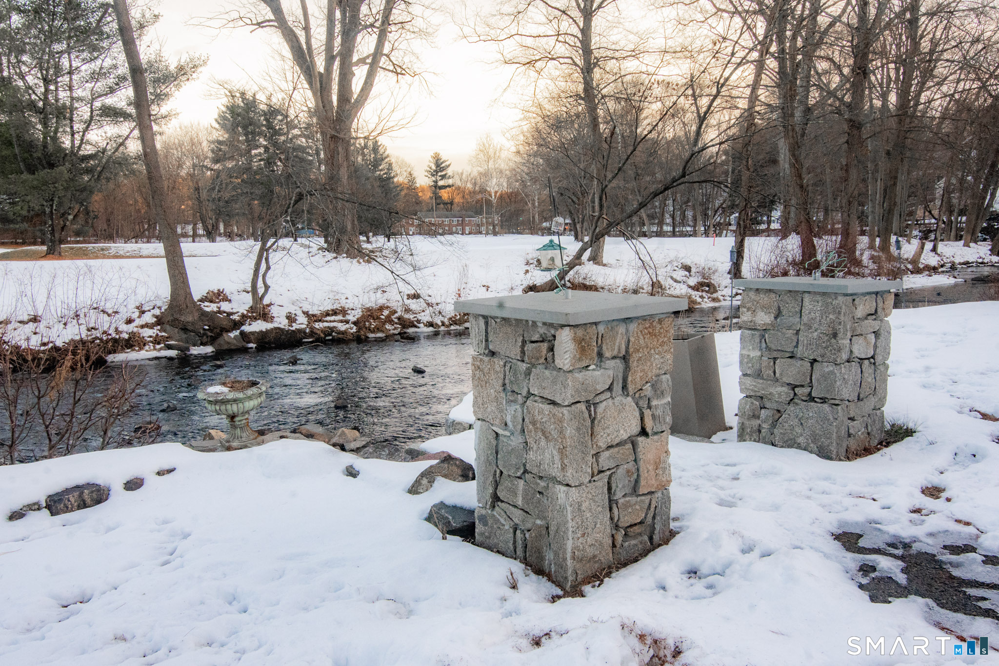 545 Church Street Naugatuck, CT 06770 - Photo 22 of 25 a view of a water fountain covered with snow in the outdoor space