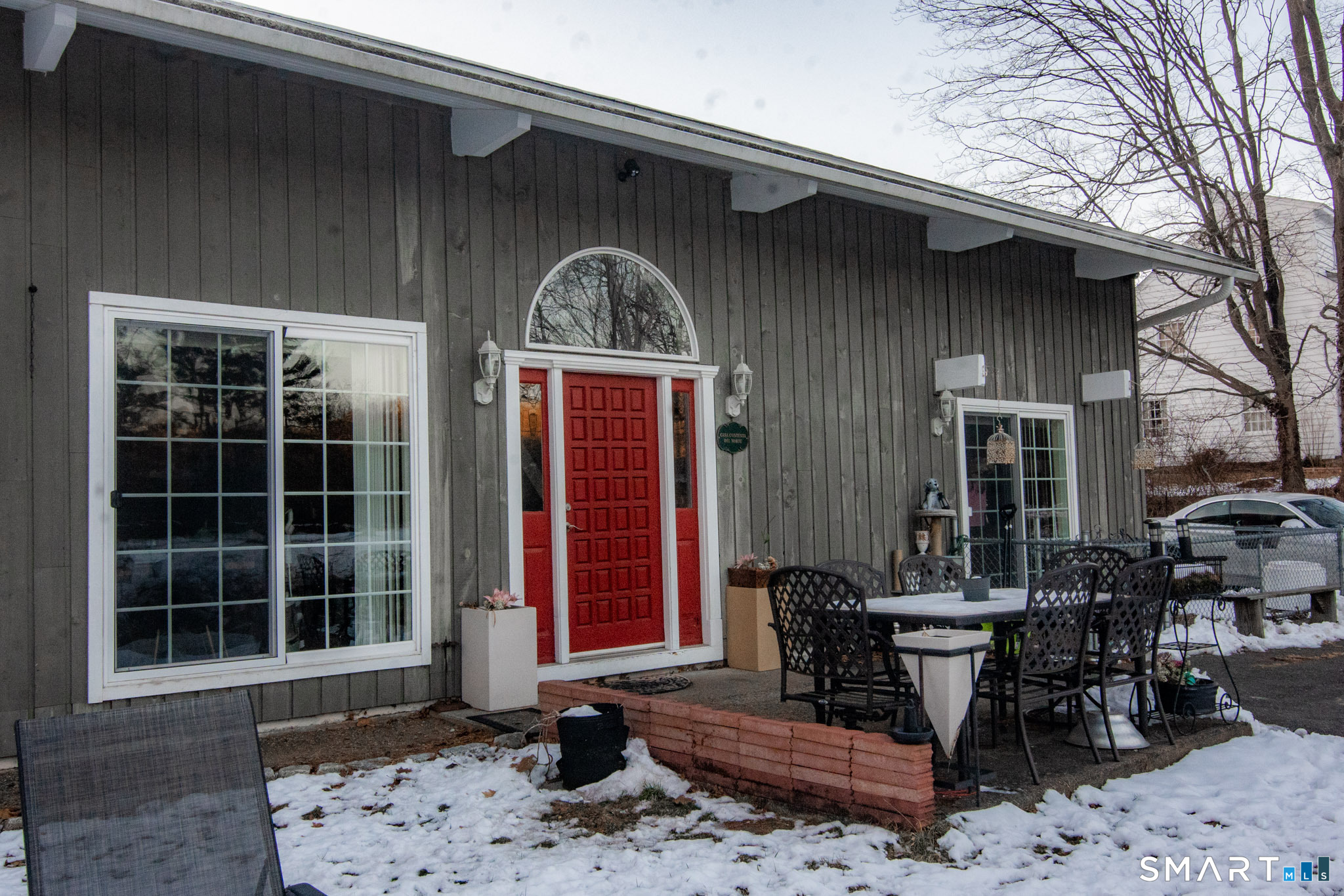 545 Church Street Naugatuck, CT 06770 - Photo 24 of 25 a front view of a house with outdoor seating