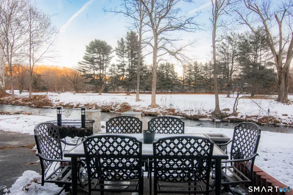 a view of a patio with a yard
