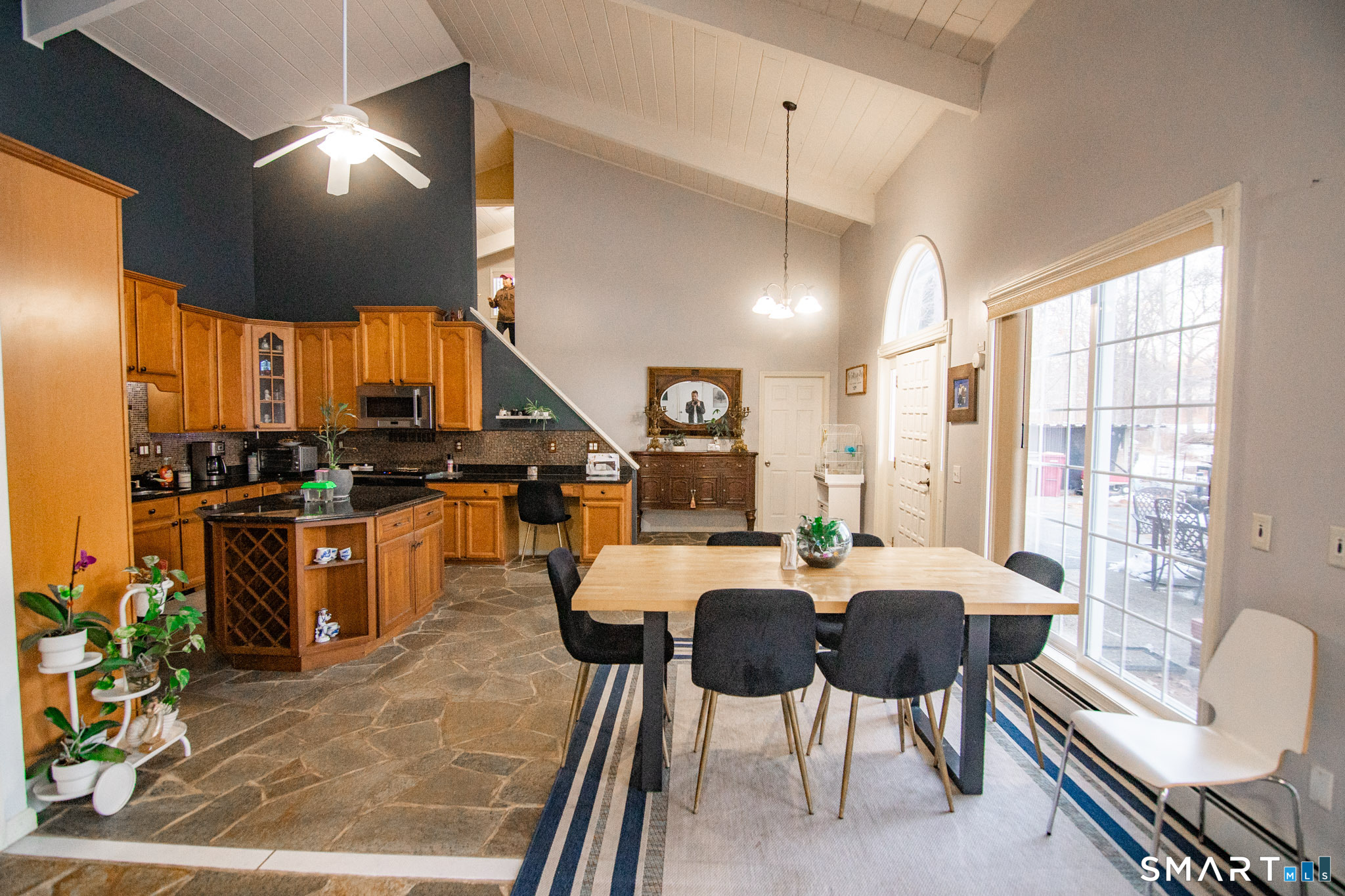 545 Church Street Naugatuck, CT 06770 - Photo 8 of 25 a large kitchen with a table and chairs