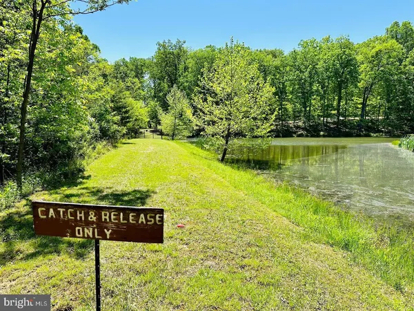 a view of a sign board with lake view