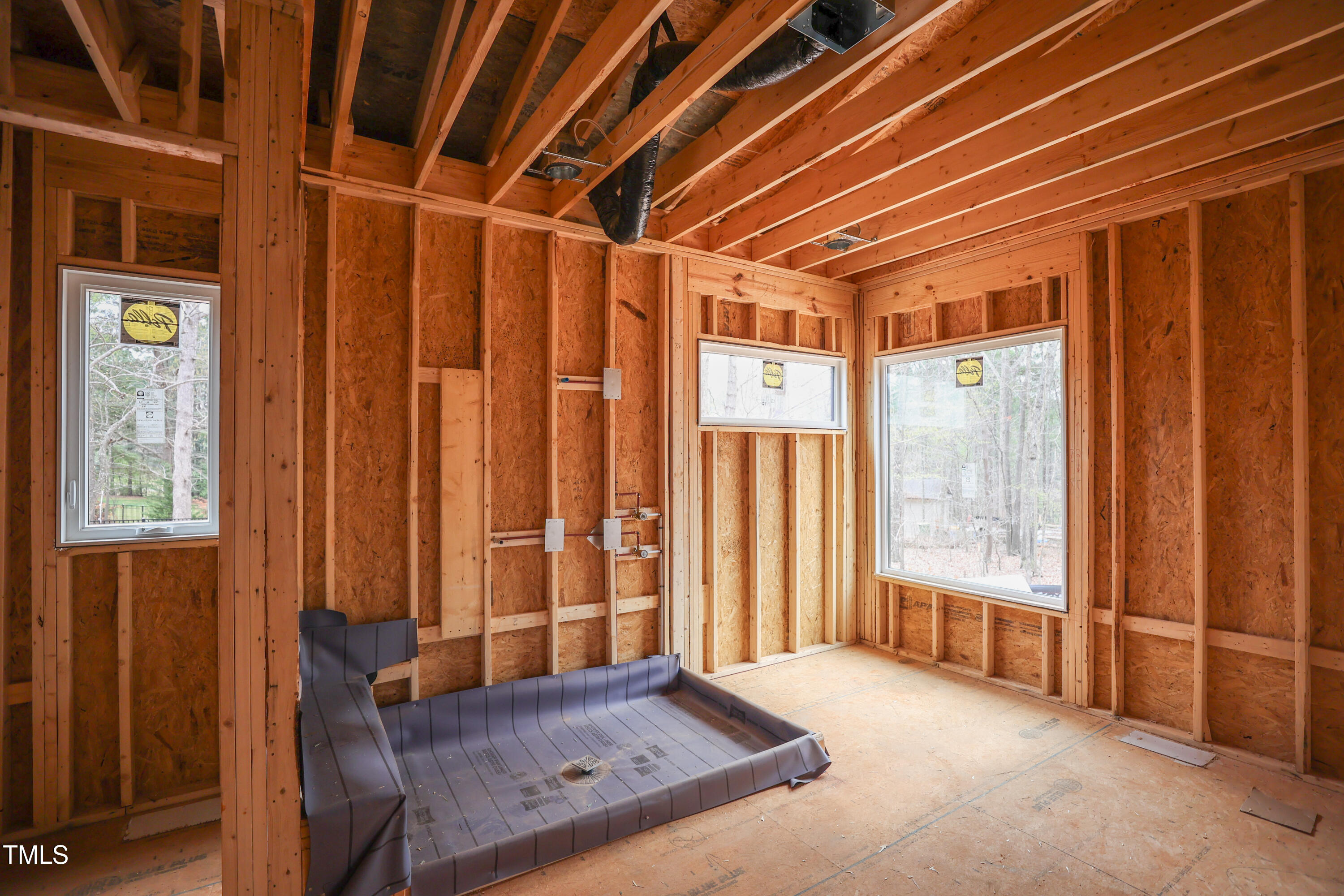 2916 Frances Marie Lane Raleigh, NC 27606 - Photo 11 of 30 a view of a room with large windows