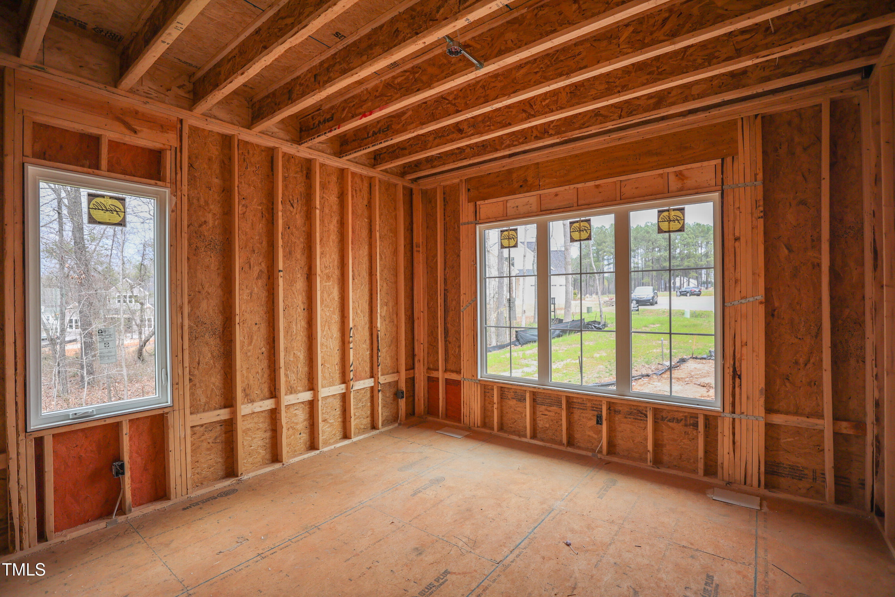 2916 Frances Marie Lane Raleigh, NC 27606 - Photo 14 of 30 a view of an empty room with a window