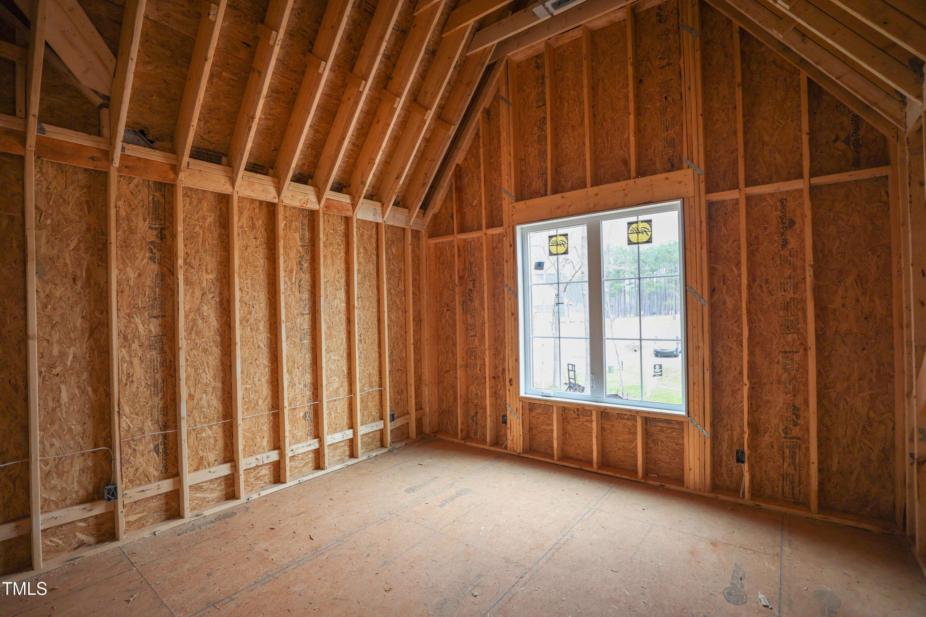 2916 Frances Marie Lane Raleigh, NC 27606 - Photo 15 of 30 a view of an empty room with a window