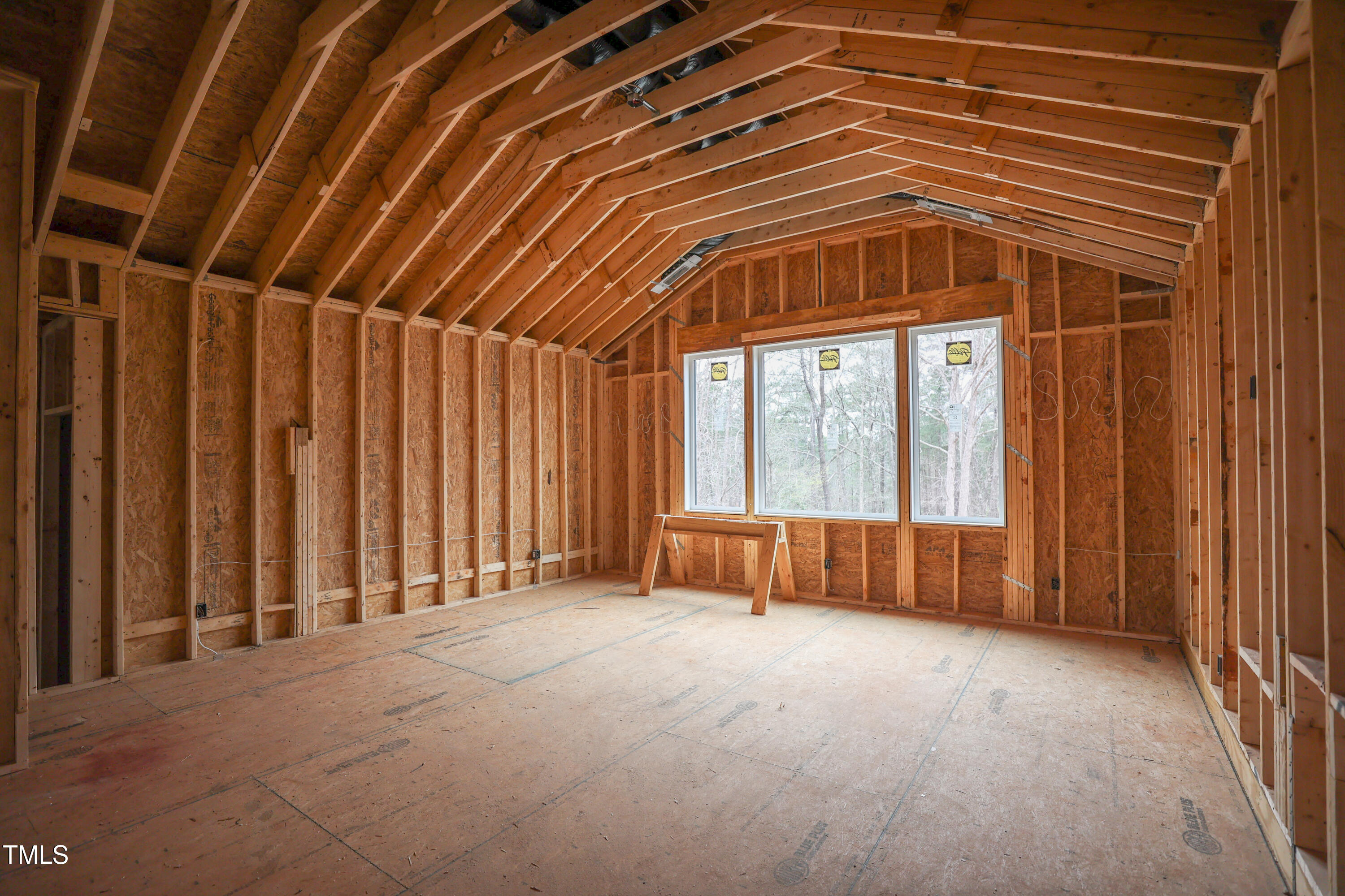 2916 Frances Marie Lane Raleigh, NC 27606 - Photo 16 of 30 a view of an empty room with a window