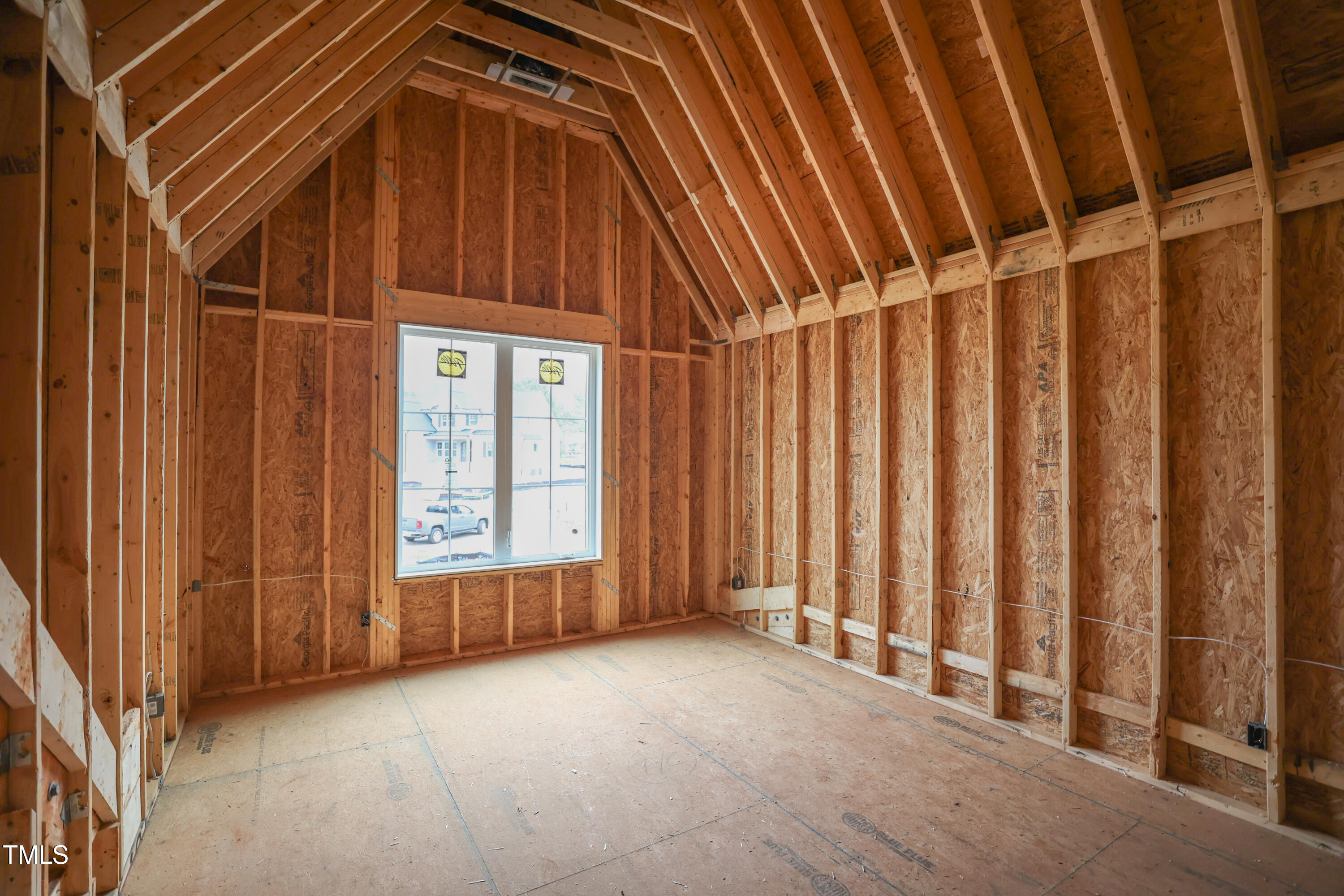 2916 Frances Marie Lane Raleigh, NC 27606 - Photo 17 of 30 a view of an empty room with a window