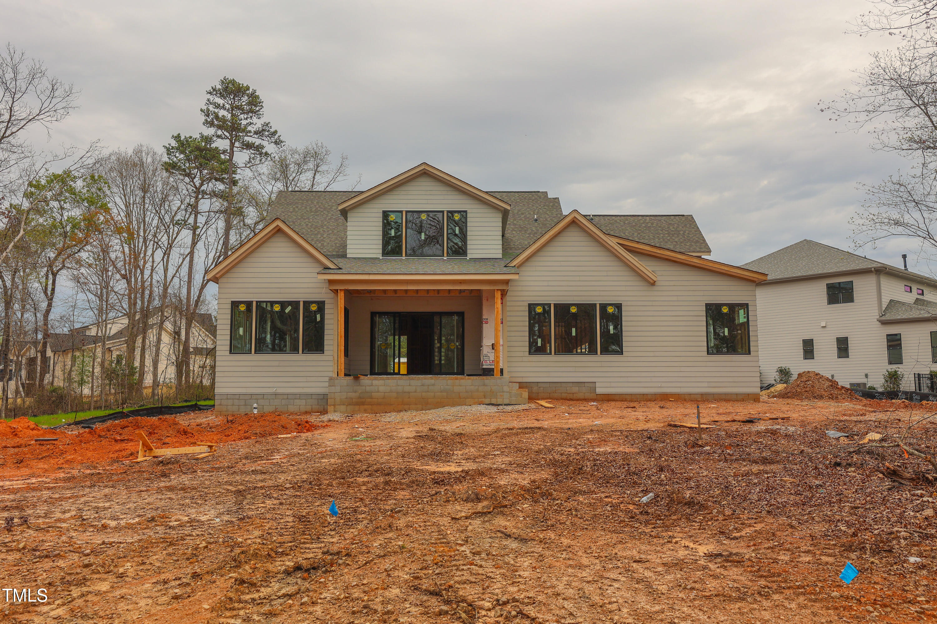 2916 Frances Marie Lane Raleigh, NC 27606 - Photo 20 of 30 a front view of a house with a yard