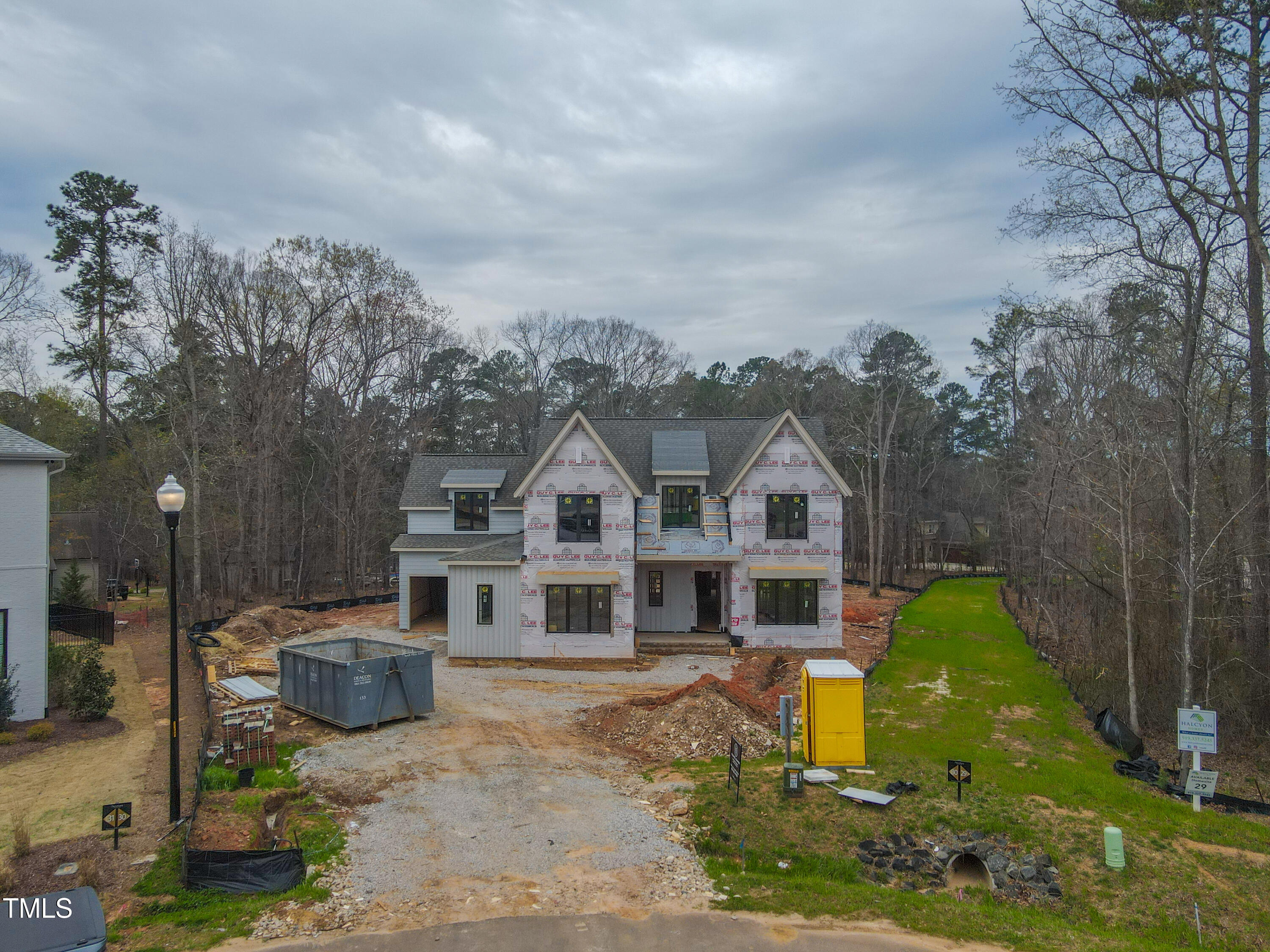 2916 Frances Marie Lane Raleigh, NC 27606 - Photo 21 of 30 a front view of a house with garden