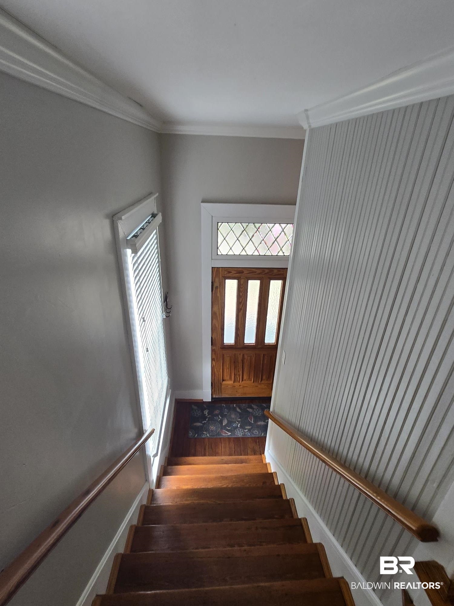 54 South Catherine Street Mobile, AL 36604 - Photo 42 of 55 Stairs featuring ornamental molding, wood finished floors, and baseboards