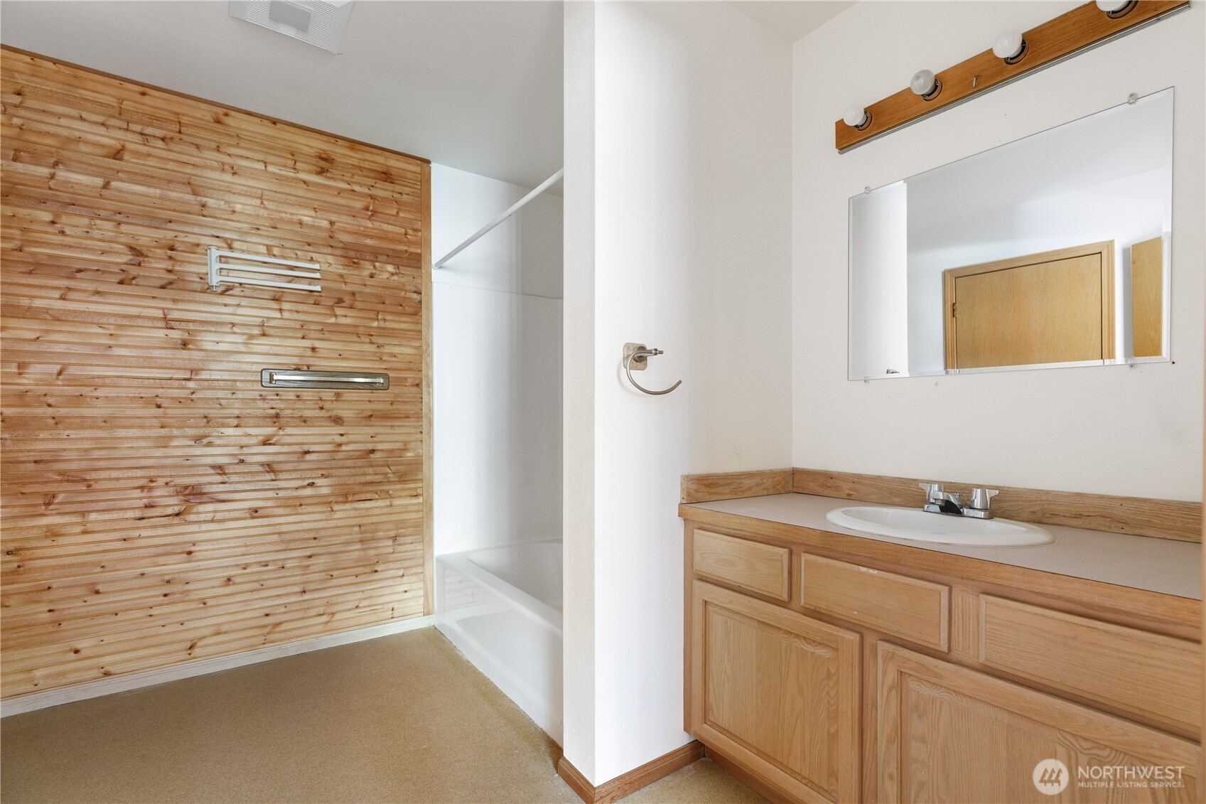 5474 Wilkinson Road Langley, WA 98260 - Photo 24 of 40 a bathroom with a sink and a shower