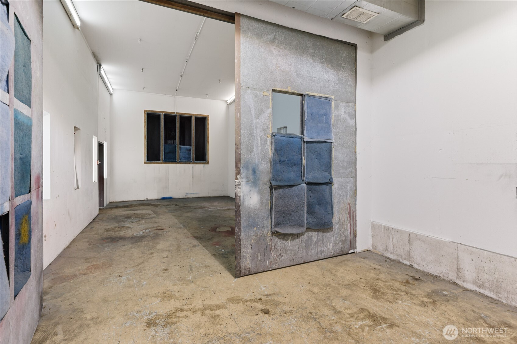 5474 Wilkinson Road Langley, WA 98260 - Photo 36 of 40 a view of a hallway with a bathroom