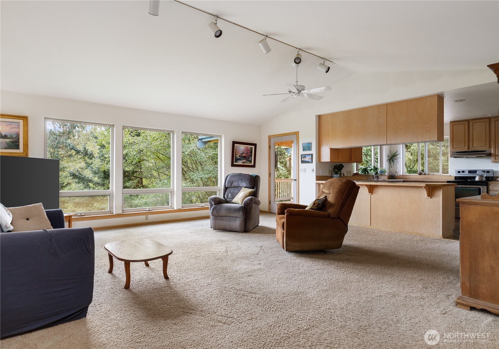 5474 Wilkinson Road Langley, WA 98260 - Photo 5 of 40 a living room with furniture and a large window