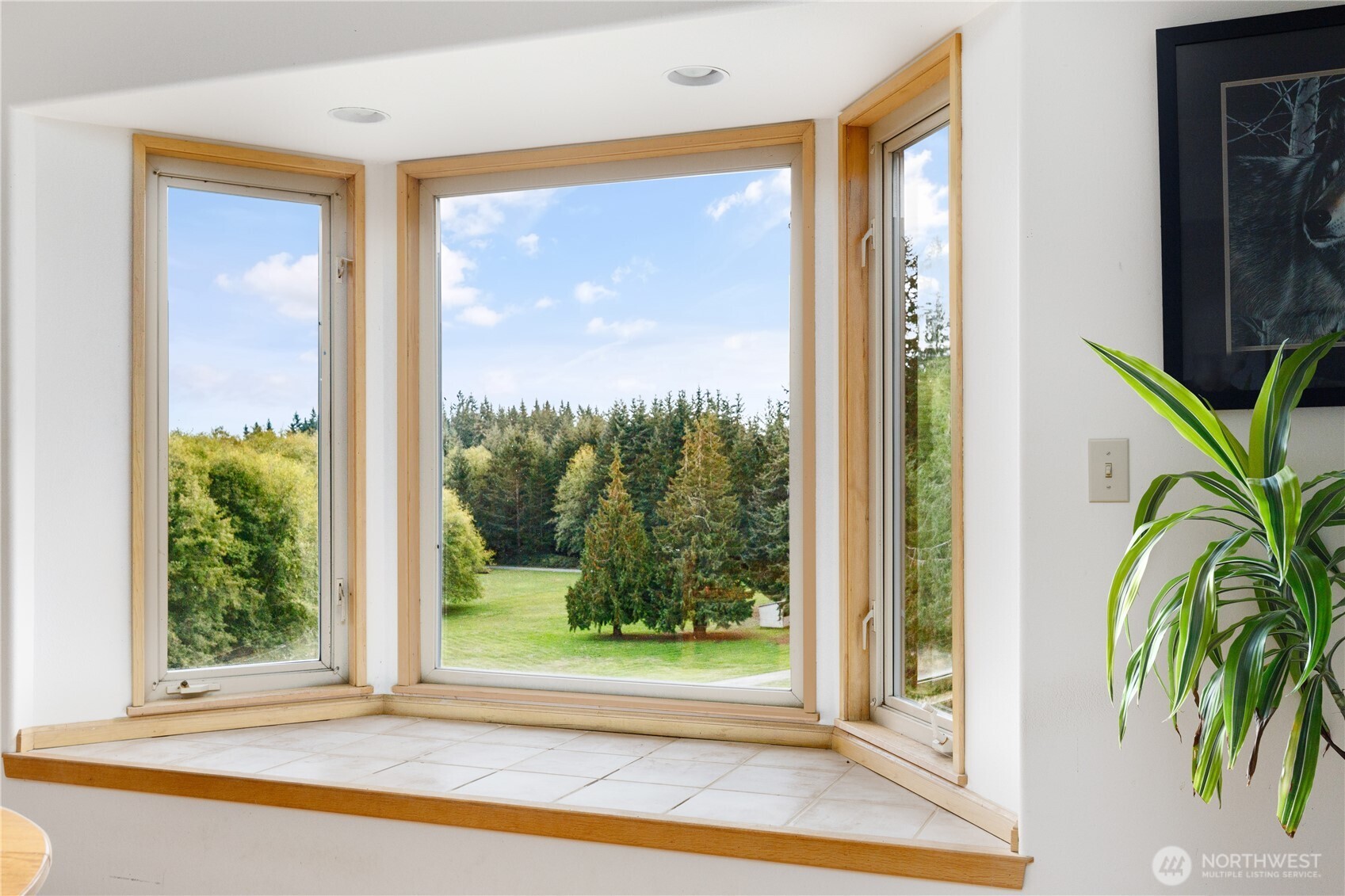 5474 Wilkinson Road Langley, WA 98260 - Photo 9 of 40 a view of a room that has a window