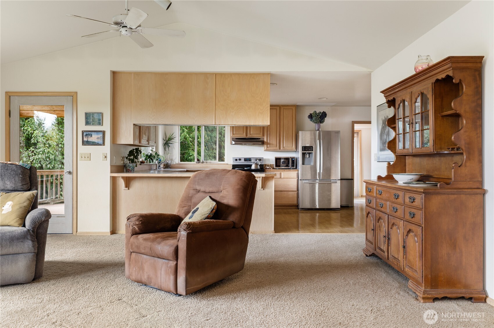 5474 Wilkinson Road Langley, WA 98260 - Photo 10 of 40 a living room with furniture and large windows