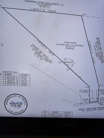 a view of grassy field with mountain