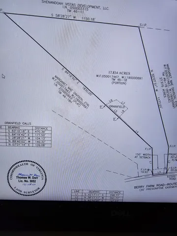 a view of grassy field with mountain