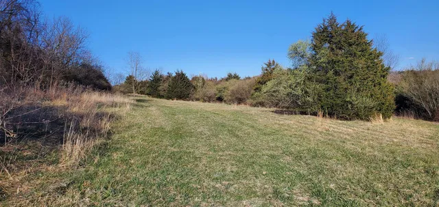 a view of mountain with sunset view