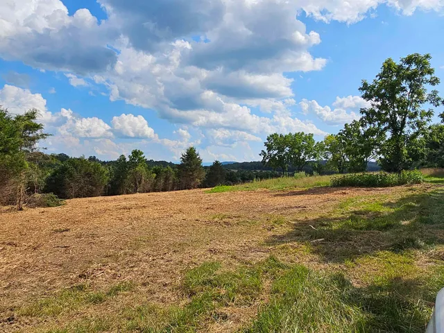 a view of a yard covered with snow