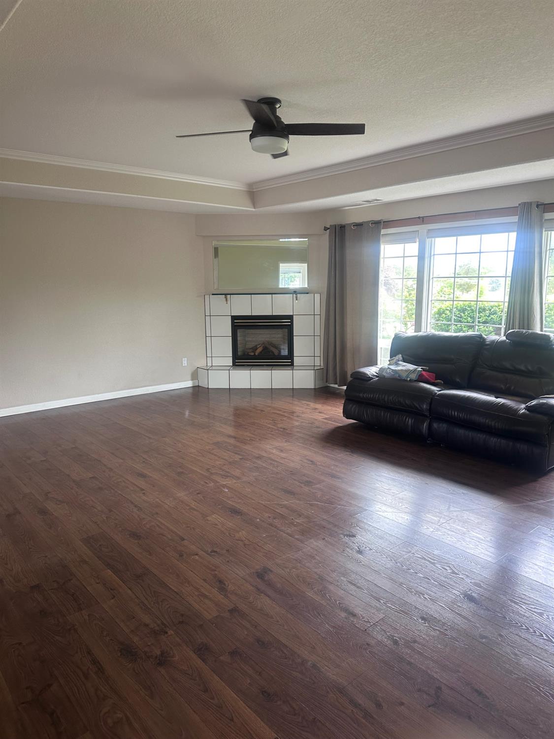 7124 Ospital Road Valley Springs, CA 95252 - Photo 28 of 37 a living room with furniture and a fireplace