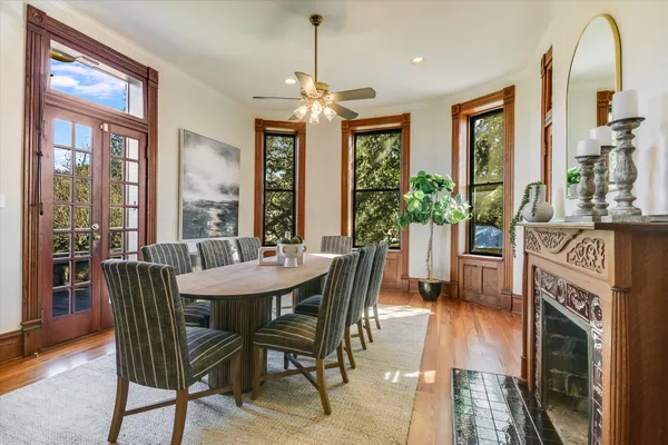 a view of a dining room with furniture window and outside view