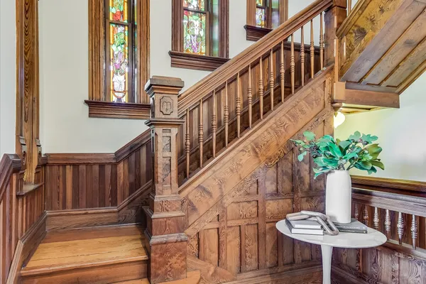 a view of balcony with furniture