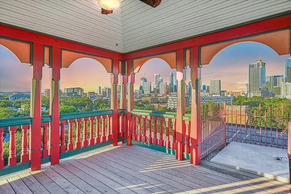 a view of a house with a yard and garden